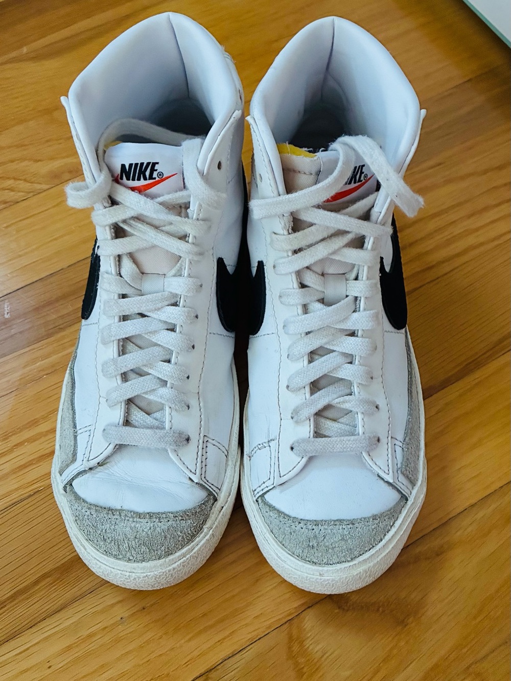 Nike White High-Top Sneakers with Black Swoosh and Gray Suede